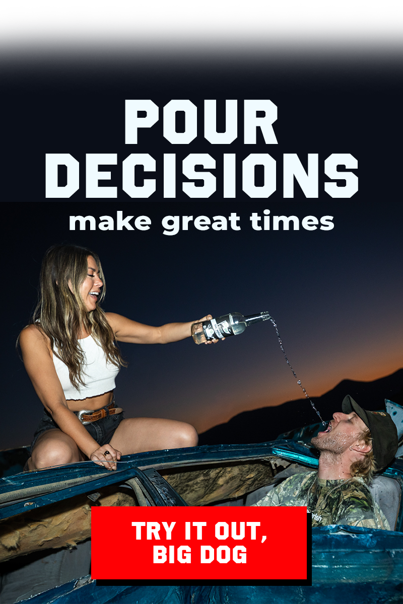 A woman pouring a beverage into a man's mouth with the text 